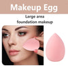 A pink makeup egg foundation product shown next to a model applying large area foundation makeup.