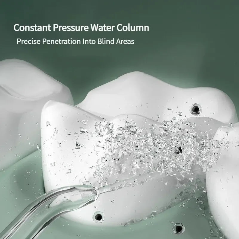 A close-up of a white water column device creating a spray of water, demonstrating precise penetration into blind areas.