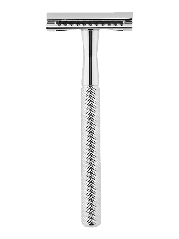 A silver vintage double edge safety razor kit with a metallic handle and blade assembly.