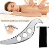 Stainless steel Gua Sha scraper tool being used on a person's skin for massage