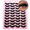 Plateau en plastique rose contenant un kit de faux cils de mink naturels.