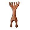 A set of wooden sandalwood massager combs with branching handles.