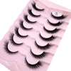 Un plateau en plastique rose contenant un ensemble de faux cils de renard noirs.
