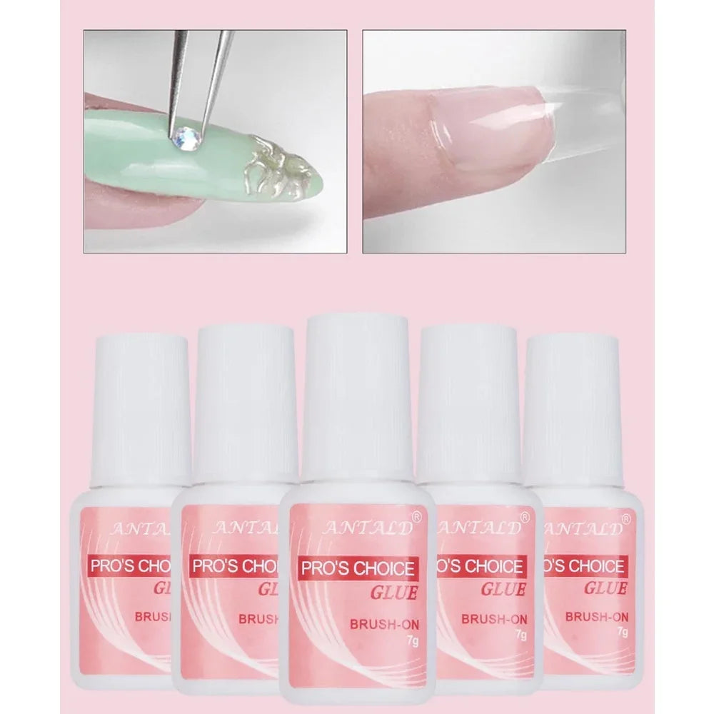 A set of clear nail glue and brush-on glitter for acrylic art application.