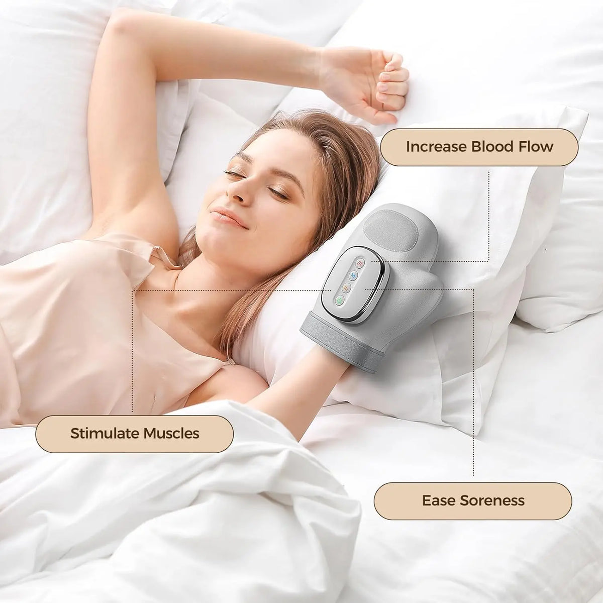 A woman is using a gray electric hand massager on her arm while relaxing in bed.