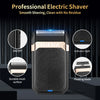 A black electric shaver with a floating blade and mesh surface is shown on a dark background.
