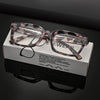 A pair of tortoiseshell and leopard print blue light blocking reading glasses displayed in their box.