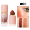 A tube of liquid blush and a round stick applicator showing various shades on skin.