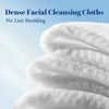 Close-up of white dense facial cleansing cloths showing soft folds and texture.
