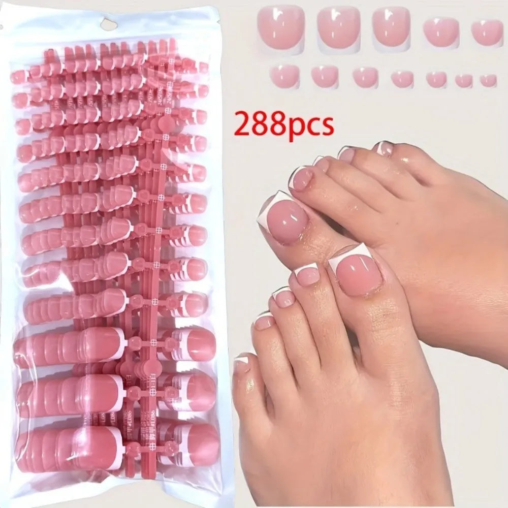 A set of 288 press-on acrylic false toenails in pink and nude shades displayed alongside a foot.