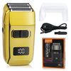 A gold electric shaver with a clear cover and charging cable, shown next to its packaging.