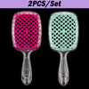 A set of two professional detangling hair brushes, one pink and one mint green.