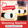 A white upgraded version of a slimming machine abdominal massager belt is shown being used on a person's lower abdomen.