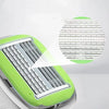 A close-up view of a light green precision manual safety razor with a magnified grid pattern overlay.