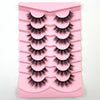 Plateau en plastique rose affichant divers styles de faux cils de renard dramatiques.