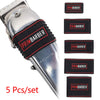 A set of five black silicone anti-slip trimmer grips for a grooming device.