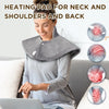 A woman is using a gray electric heating pad for neck and shoulders and back massage.