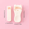 A white cartoon mini eyelash curler shown against a pink background with dimension measurements.