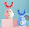 A pink and blue 360° sonic electric toothbrush set for kids with interchangeable brush heads displayed on a pink stand.