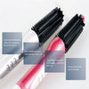 A pink ceramic hair straightener with a black barrel and various functions shown on the device.