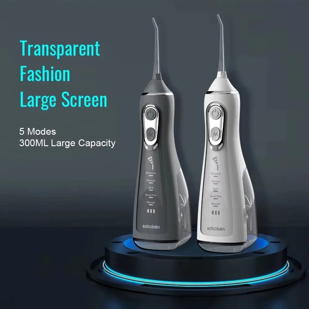 A transparent fashion large screen oral irrigator device with a black and silver finish resting on a dark surface.