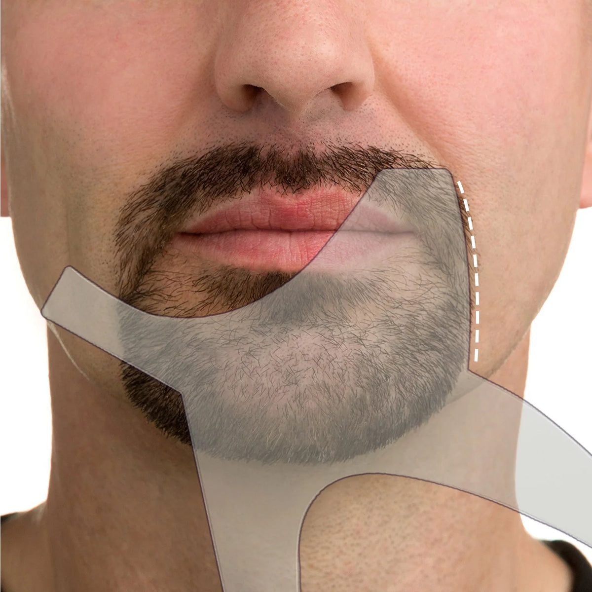 A close-up of a man's face showing a professional beard shaping tool being used to style his mustache and beard.