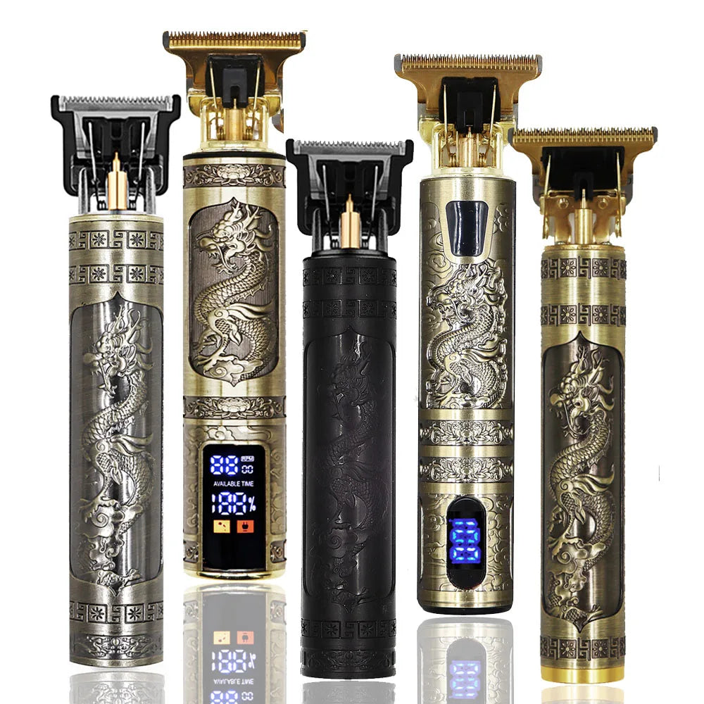 A set of professional electric hair clippers and beard trimmers in gold and black finishes.