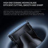 A close-up view of a black ceramic moving blade hair clipper, highlighting its design and precision cutting capabilities.