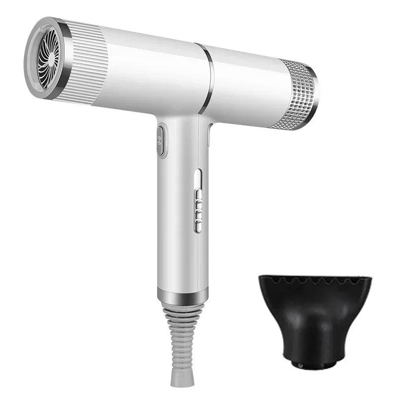 A silver professional infrared blow dryer with a detachable black nozzle.