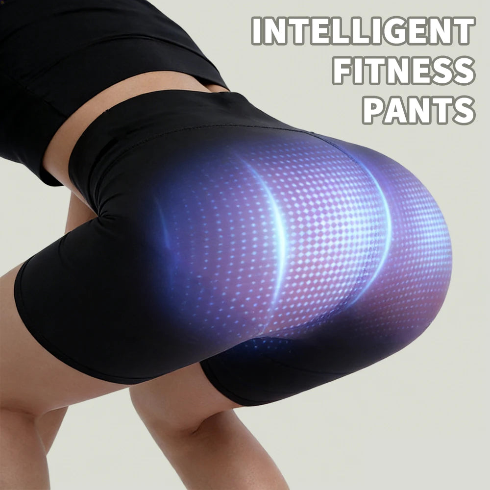 A close-up of black intelligent fitness pants with glowing blue and purple light on the thigh area.