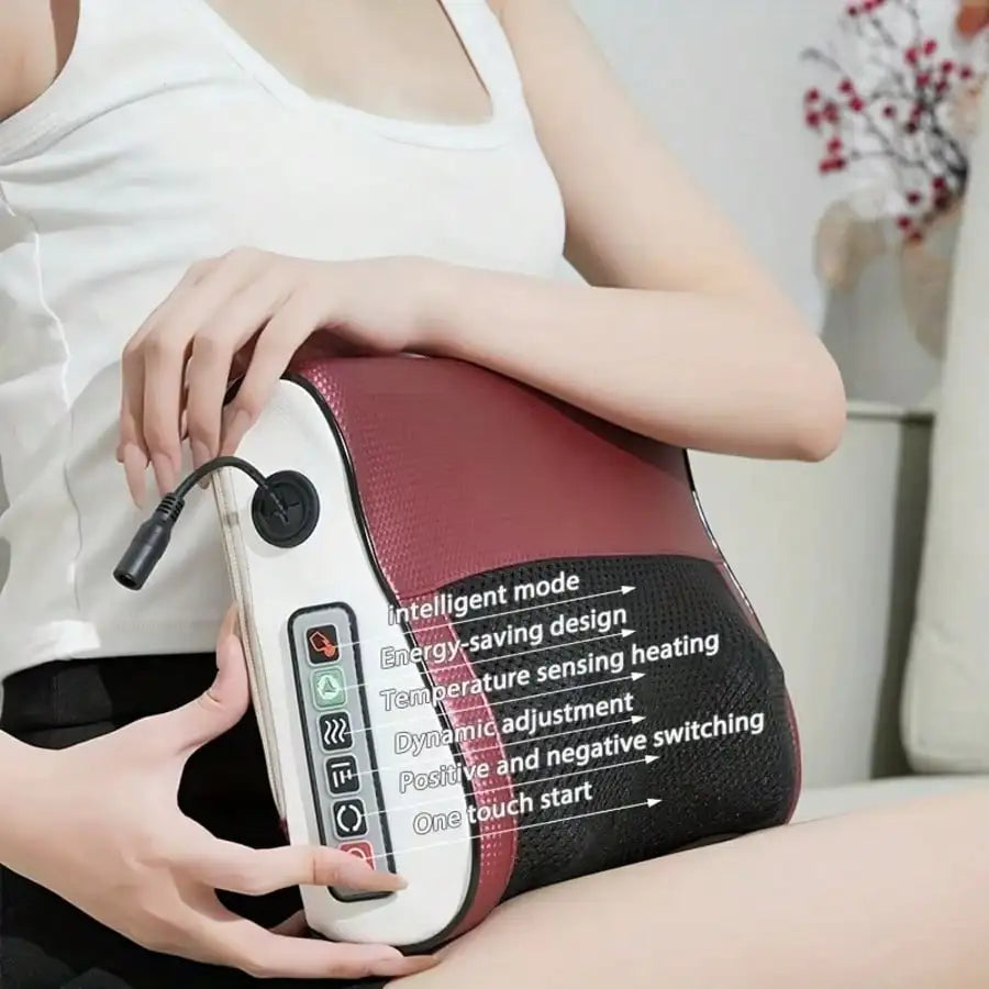 A hand holds a maroon electric neck and body massager with various functions displayed on the side.