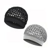 A pair of reversible satin wrap caps or bonnets for hair and sleeping, shown in black and gray.