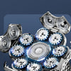 Close-up of a floating cutter head large area contact shaver with multiple rotating heads on a silver device.