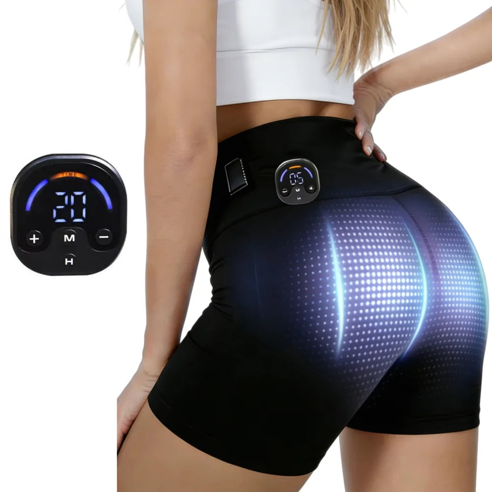A woman is wearing black EMS body shaper yoga pants with a control device visible on the side.