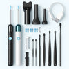A collection of black and silver HD ear cleaning tools including a camera, spoons, and various cleaning instruments.