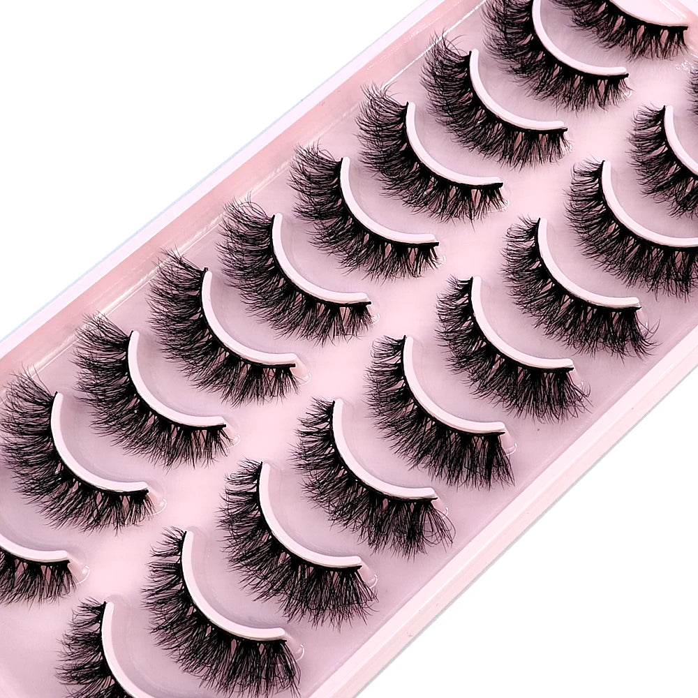 A tray of 10 pairs of natural look false mink eyelashes displayed on a white background.