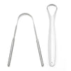 A reusable stainless steel tongue scraper and oral brush tool.