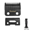 Black replacement blades for a hair clipper with mounting holes and a distinct serrated edge.