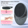 A gray silicone facial cleansing brush with a textured head is shown next to diagrams illustrating its cleaning function.