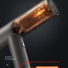 A close-up view of an electric hair dryer demonstrating intelligent temperature control with heat distribution lines.