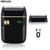 A black portable electric shaver with a textured head and a gold charging indicator, shown next to its charging cable.