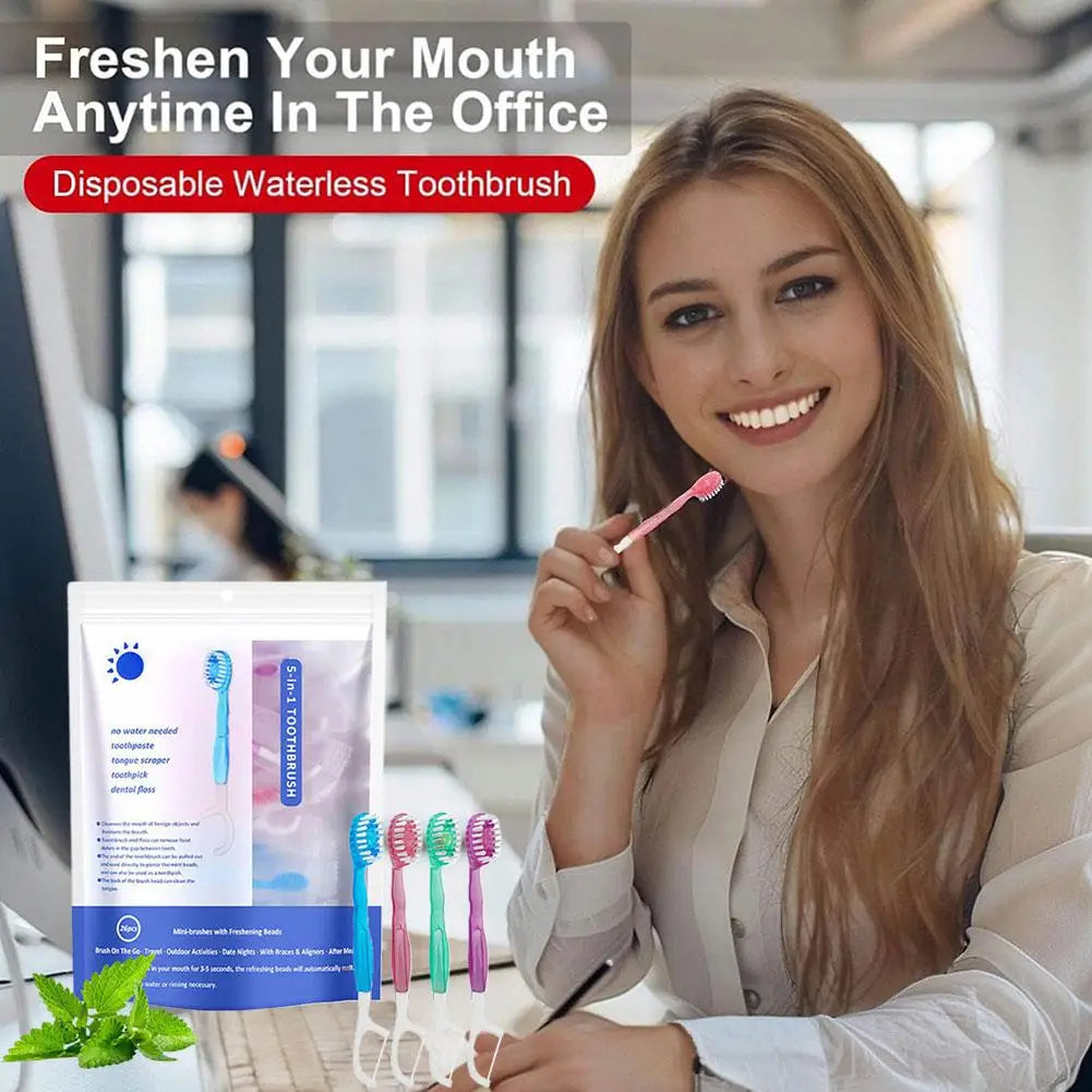 A woman holds a disposable waterless toothbrush and several toothbrushes in an office setting.