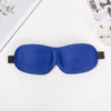 A royal blue comfortable 3D sleep mask for light blocking lying on a white surface.