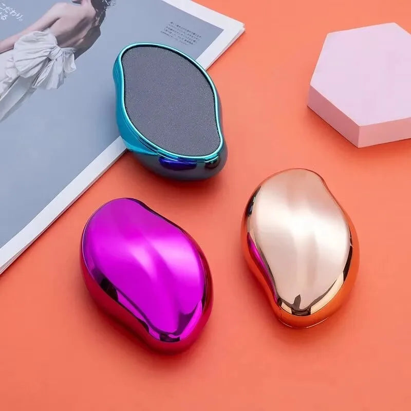A pink metallic glass foot file tool is shown next to a white booklet on an orange background.