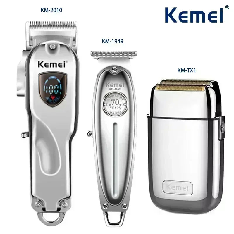 Three Kemei electric hair clippers models KM-2010, KM-1949, and KM-TX1 displayed together.