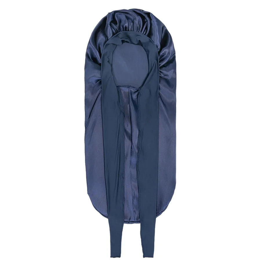 A dark blue satin silk hair bonnet cap shown vertically.
