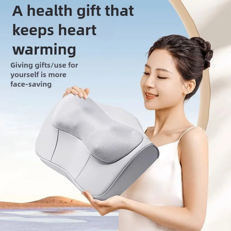 A woman is holding a white shiatsu massage pillow designed to keep the heart warming.