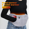 A person is holding a gray hand warmer and waist warmer two-in-one heating belt against their torso.