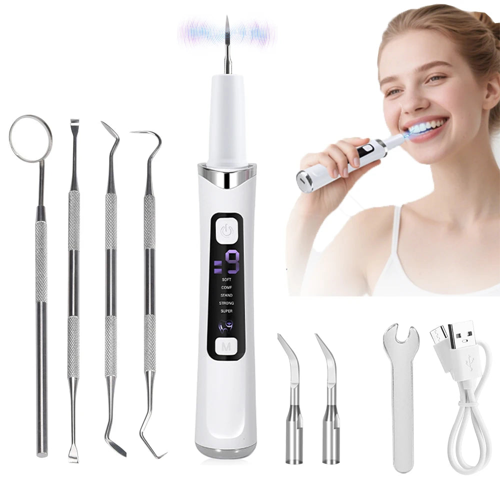 A white ultrasonic dental scaler with various tips and a handheld device being used by a smiling woman.