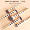 A collection of various compact soft elastic makeup brushes displayed on a light background.